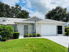 Building Photo - END UNIT VILLA!! 2B/2BA 55+ GATED COMMUN...