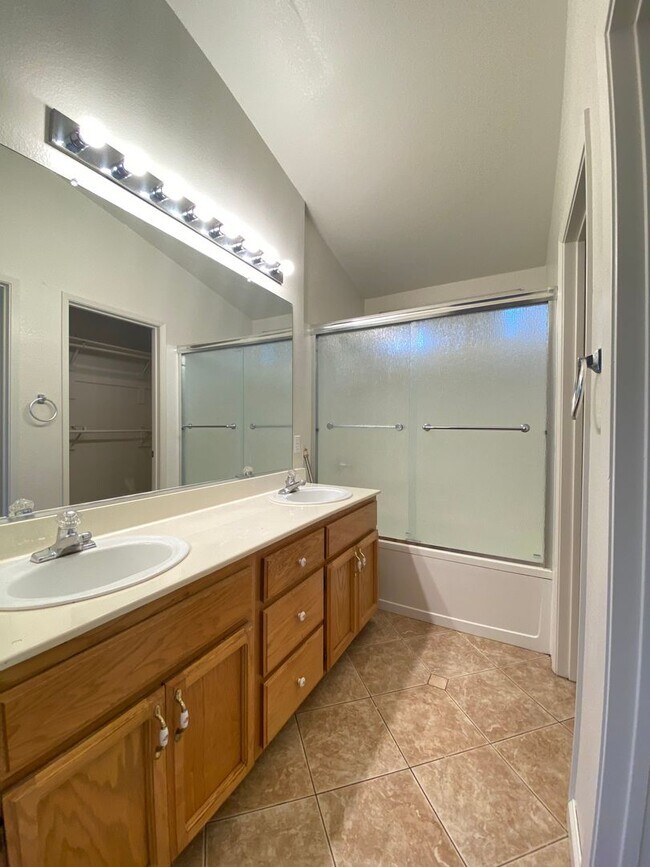 Building Photo - Spacious Home with a Pool & Hot Tub!