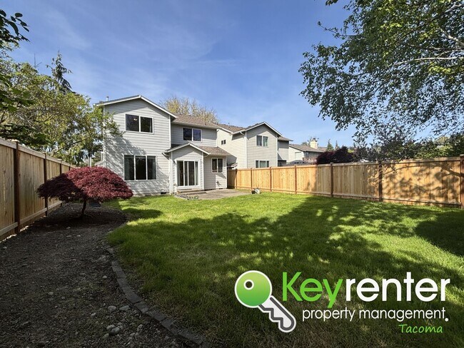 Building Photo - Elegant Browns Point Living with Backyard ...