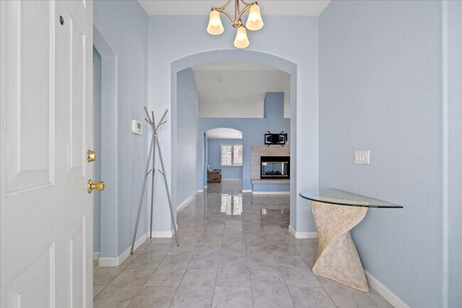 Building Photo - Multiple Living Areas 4-Bedroom Retreat with Vaulted Ceilings & No Carpet