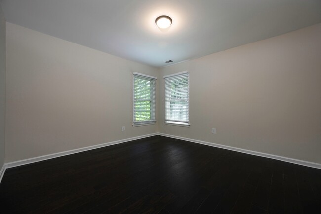 Building Photo - Spacious Bright and Beautiful End Unit Tow...