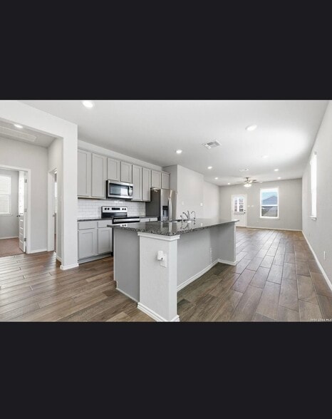 Left hallway holds two bedrooms and second bathroom - 2521 Hiddenbrooke Trce