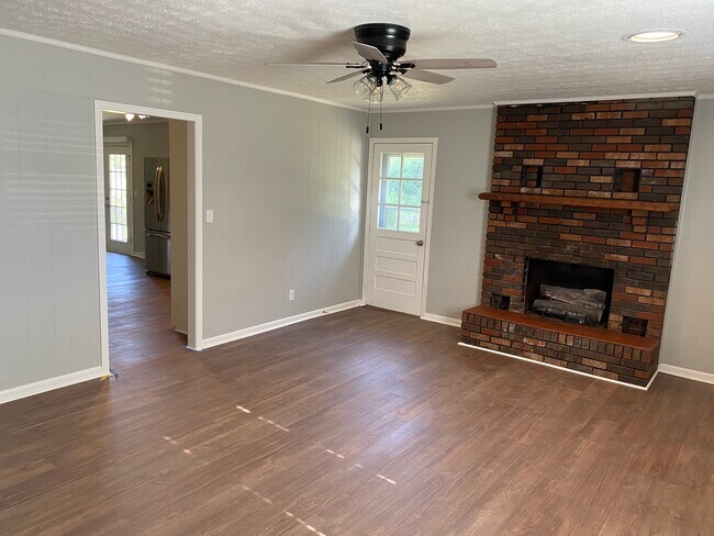 Fireplace yo be lime washed in den - 504 Luther Rd