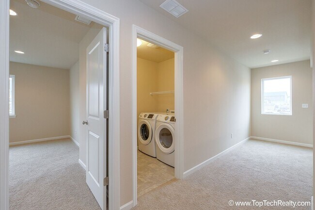 Building Photo - Spacious 4-Bedroom + Office Home in Abbey Creek – Modern Finishes, EV Charger & Low-Maintenance B...