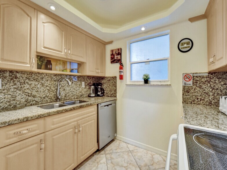 Kitchen with dishwasher - 201 178th Dr