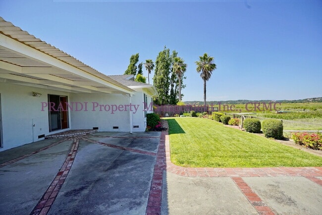 Building Photo - Serene Living on the Water’s Edge – Bright...