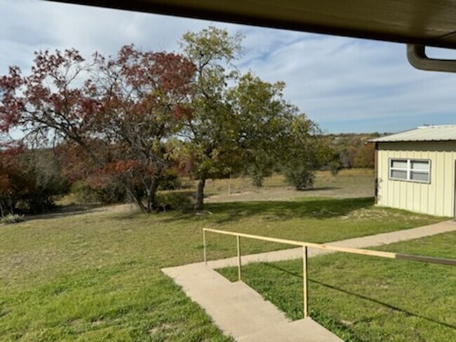 Building Photo - 4 Acres + METAL SHOP + Horses Welcome