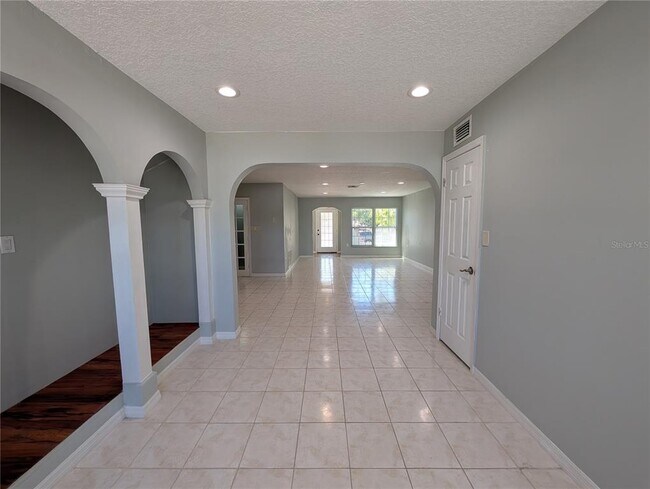 Building Photo - 6947 Bottle Brush Dr