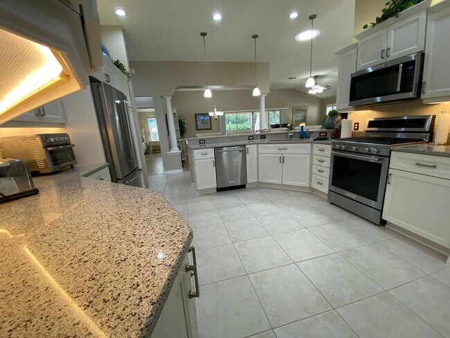 Building Photo - Gorgeous 3 + 2 Turnkey ANNUAL Lease w/Swim Spa & Large Private Screened in Patio In The Village o...