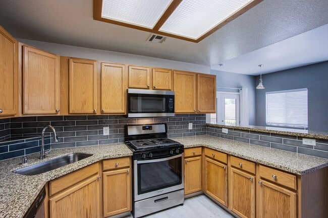 Building Photo - 9580 W Reno Ave