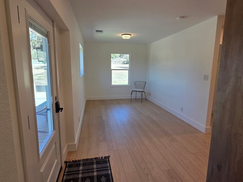 Entry door and living room - 10717 Deer Canyon Rd