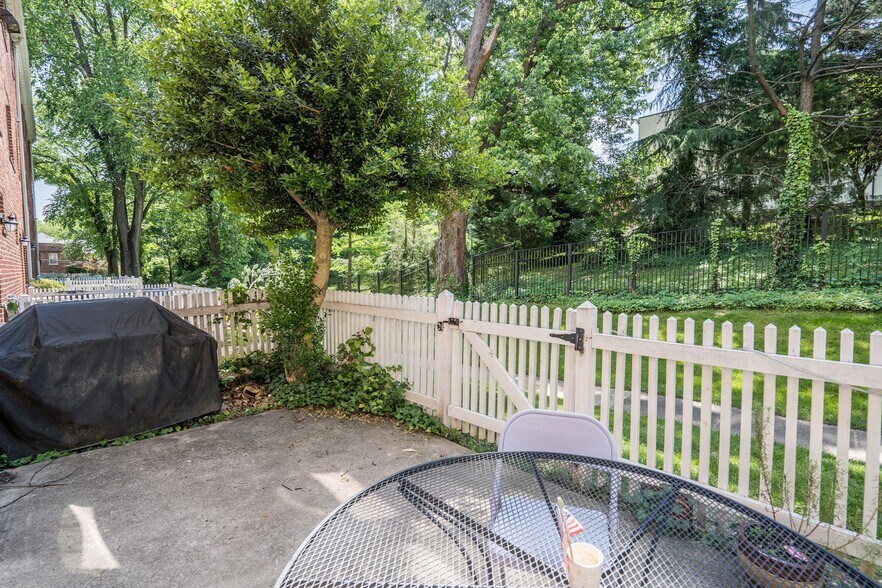Rear gate opens to Private Rear Patio! - 2908 13th Rd S