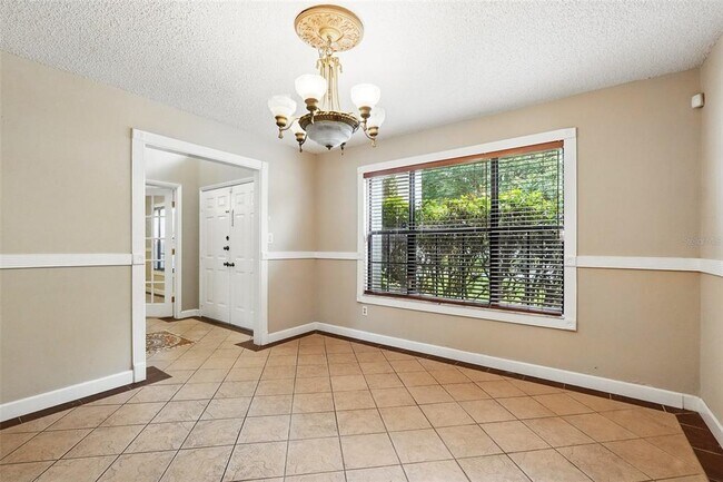 Building Photo - 7925 Tumblestone Dr
