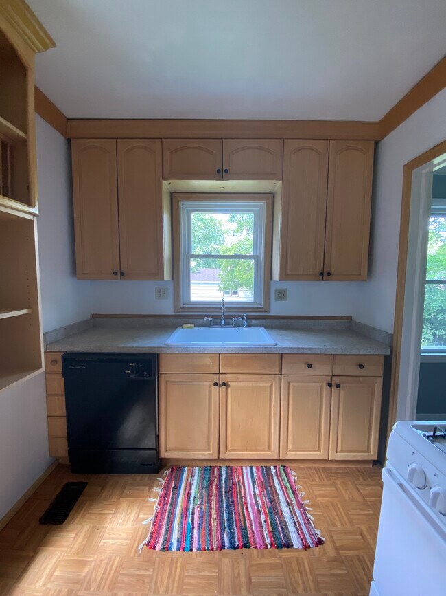 Kitchen with dishwasher and kitchen window above sink - 3915 Aldrich Ave N