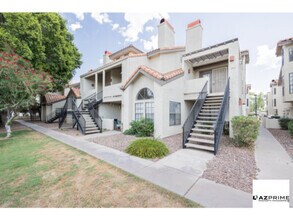 Building Photo - Live elevated in this premium upper-level ...