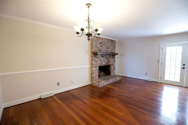 Building Photo - Available 3/1/25. Repainted & New Flooring...