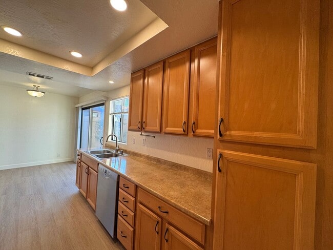 Building Photo - Tastefully updated 2 bedroom/2 bath, single level townhome w/attached 2 car garage!