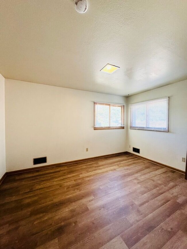 Building Photo - First Month Free - Spacious 4 bedroom 2 ba...