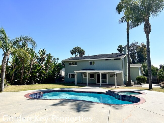 Building Photo - Welcome to this stunning 4-bedroom, 2.5-ba...