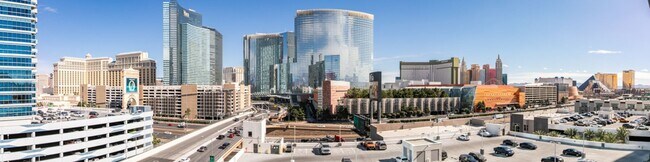 Building Photo - Iconic Strip-View Luxury | Elegant 1BR + Den High-Rise Residence