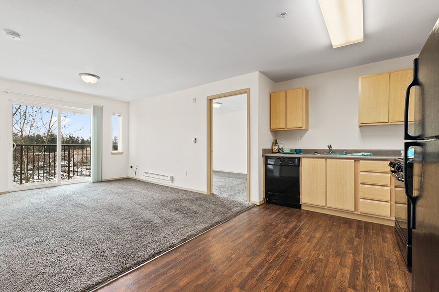 SHAG Interurban Senior Living Living Room and Kitchen - Interurban Senior Living Apartments