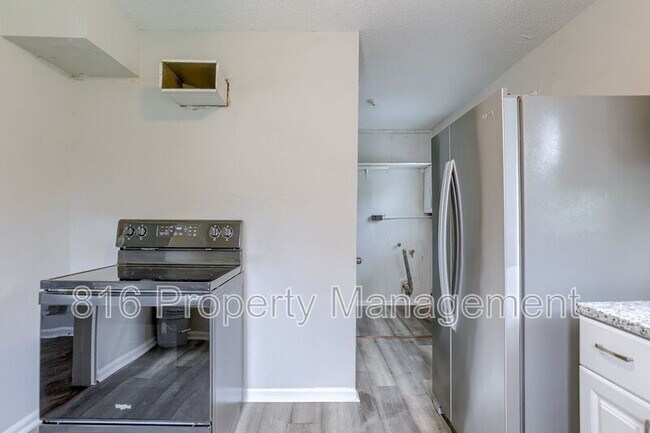 Building Photo - 7433-7435 Arletta Blvd