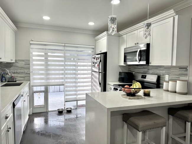 Building Photo - 7080 NW 173rd Dr