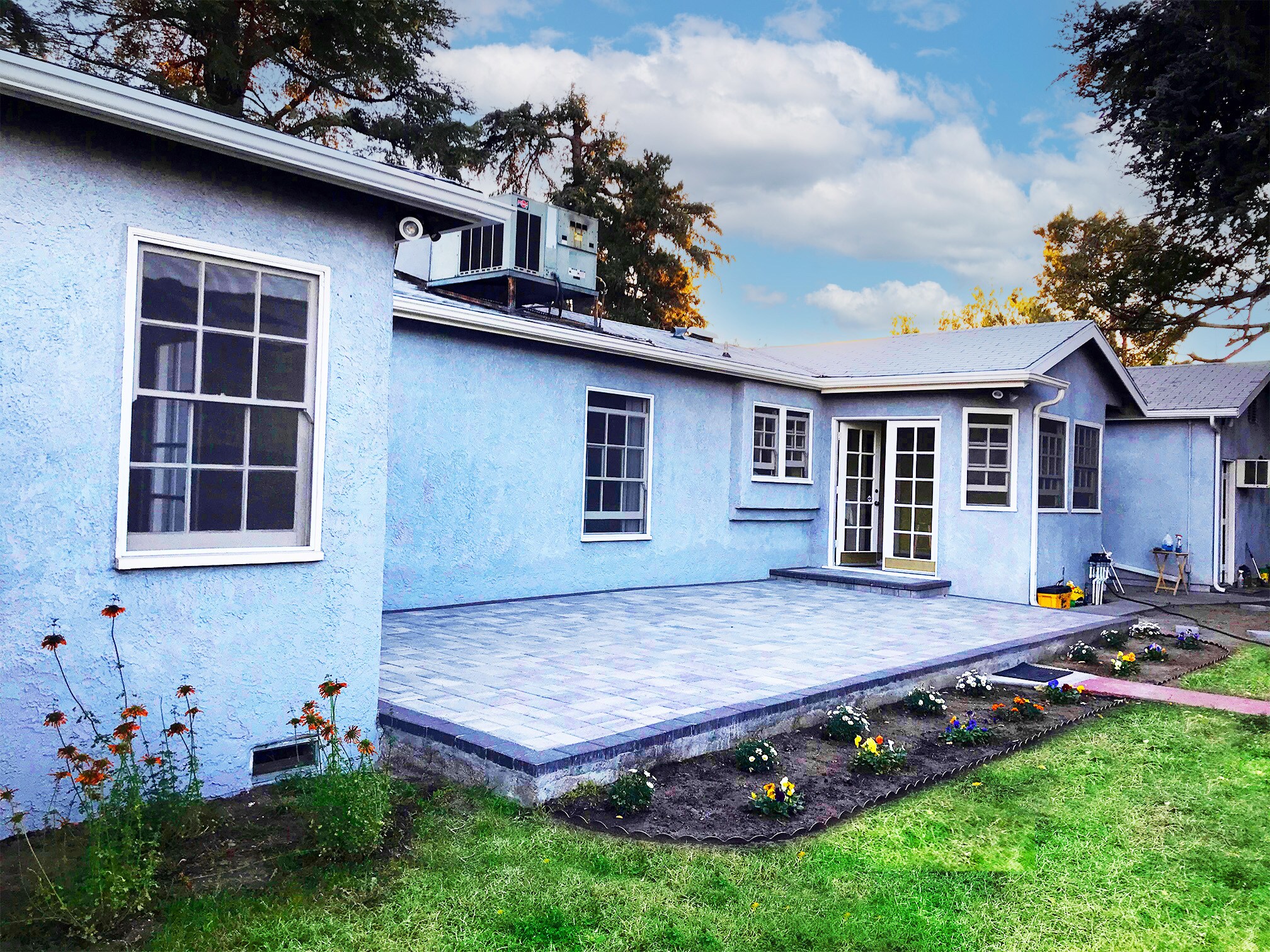 Back of the house with paved patio - 15341 Cohasset St