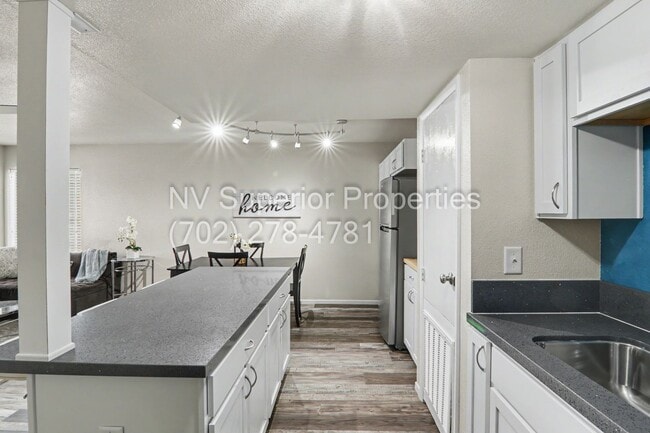 Building Photo - SE!! Close to UNLV!! 2 Bedroom 2 story!! 1 Car Carport!! Fully Furnished!! Community Pool!! and T...