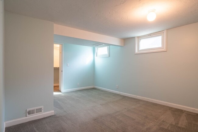 Building Photo - Beautiful Brick Home with Garden, Finished Basement & Detached Garage Office