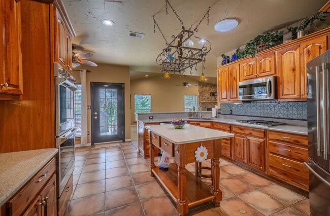 Building Photo - Spacious Single Level Four Bedroom Home In Gated Community