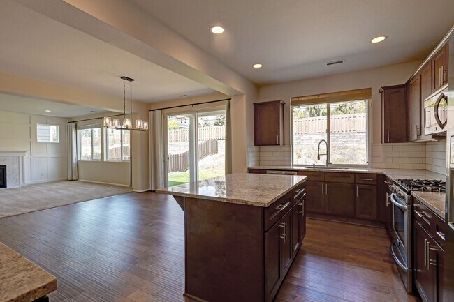 Building Photo - 4 Bedroom Home with Open Den, Living & Family Rooms – Space for Everyone