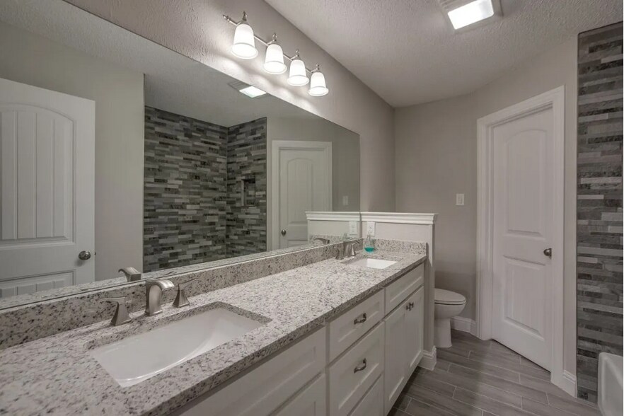 Secondary Bathroom with large linen closet - 2311 Blackhaw Ct