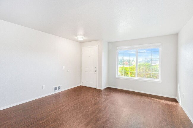 Building Photo - Recently updated 3 bdrm, 2 bath. Attached garage. Wrap around yard. Private upstairs bedroom and ...