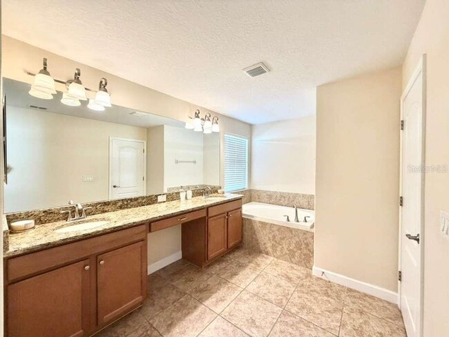 Building Photo - 8894 Candy Palm Rd