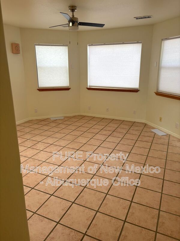 Building Photo - 8220 W Raintree Dr NE