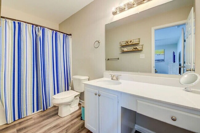 Building Photo - Coastal Comfort Awaits: *FULLY FURNISHED* ...