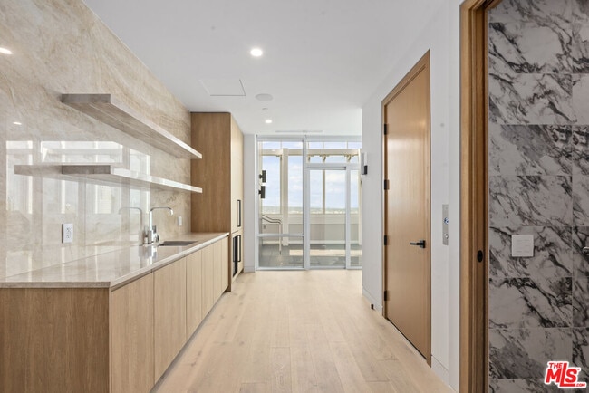 Building Photo - 230 W Olympic Blvd