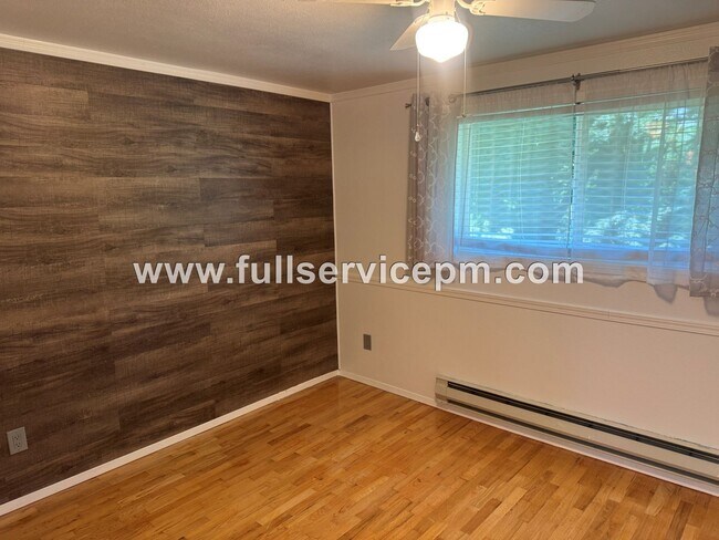 Building Photo - Spacious 4-Bedroom Upper-Level Home with Fireplace, Bonus Room & Large Deck