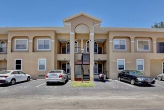 Building Photo - Spacious 3/2 Condo with a Cover Patio Area in the Desirable Palm Villas - Kissimmee!