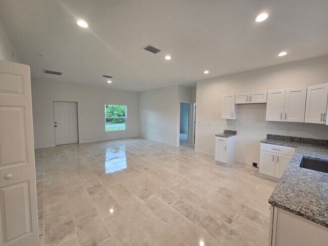 Building Photo - BRAND NEW 3/2/1 -SW LEHIGH ACRES FL