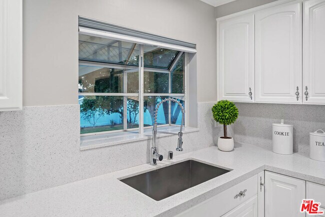 Building Photo - 18334 Los Alimos St