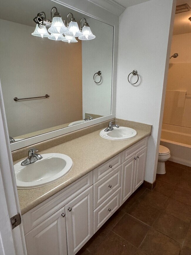 Building Photo - Single Level Home w/HUGE fenced yard, AC, W/D, Garage & More!