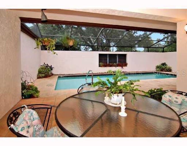 Building Photo - 2/2 Maintenance-Free Glen Oaks Courtyard Home with Private Pool