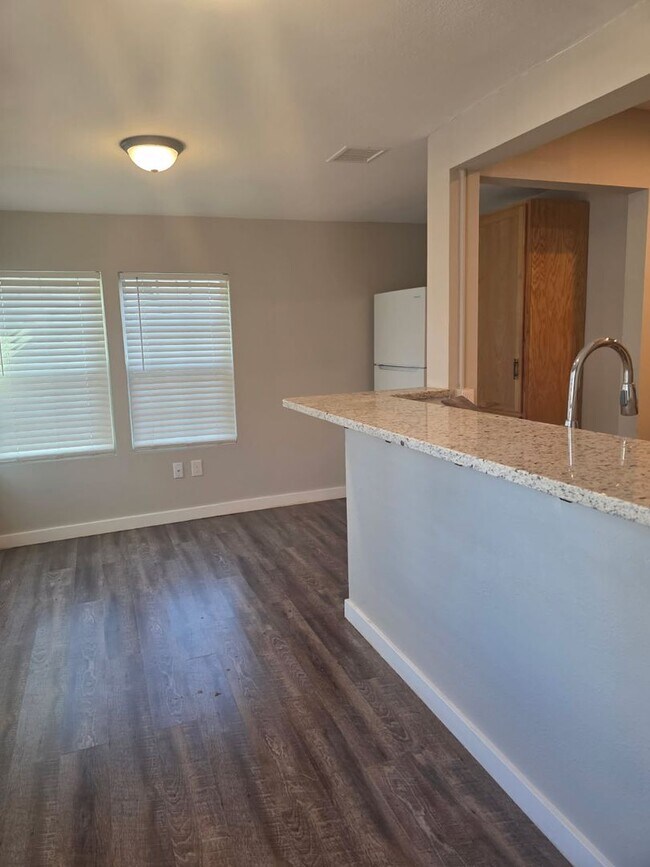 Building Photo - Step into this updated 4-bedroom, 2-bath home ideally situated in the heart of Sand Springs.