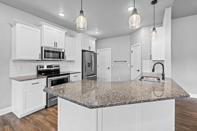 Building Photo - Spacious 4-Bedroom Home with Open Layout, ...