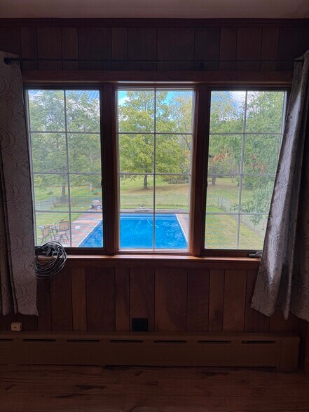 View of backyard thru large window - 6414 State Route 233