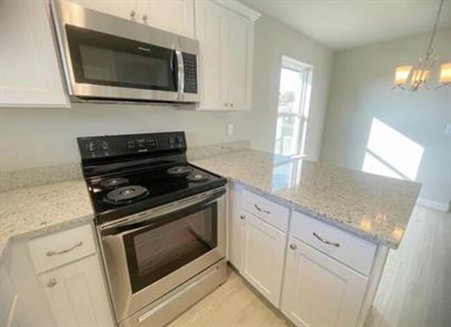 Building Photo - Cozy 2 bed, 2 bath Duplex - Silo School District