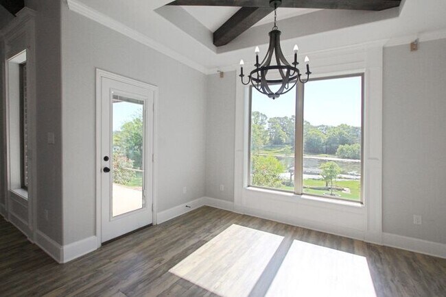 Building Photo - Tour Today! Beautiful 4-Bedroom, 2-Bathroom Home Overlooking a Pond!