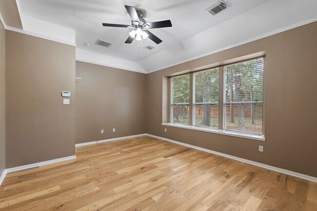 Building Photo - The Perfect Woodlands Retreat: Steps from ...